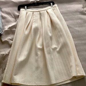 STOREE pleated, patterned skirt. Only worn once.